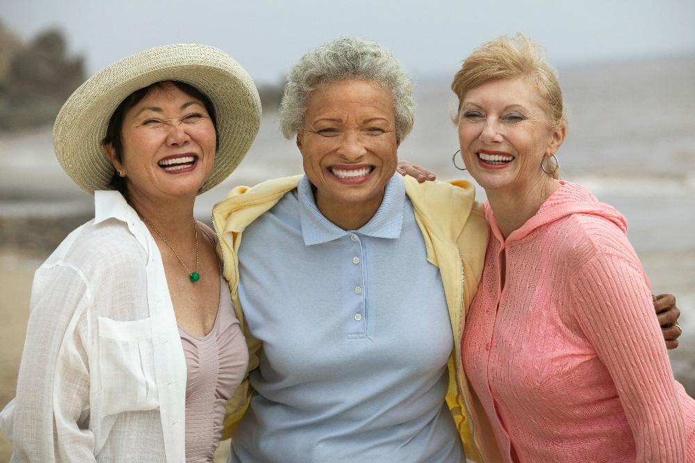 group of older women smiling | dentist reservoir