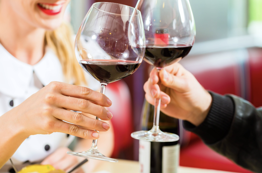 couple drinking wine | teeth whitening in reservoir, vic