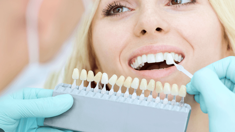 Woman getting teeth whitened in Narre Warren
