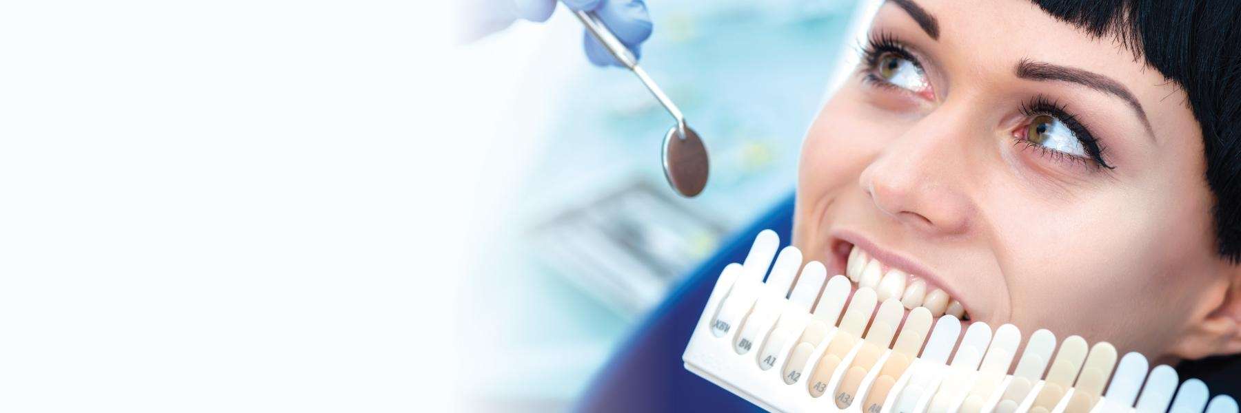 woman getting teeth whitened in reservoir